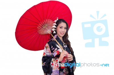 Beautiful Young Asian Woman Wearing Traditional Japanese Kimono With Red Umbrella Isolated On White Background Stock Photo