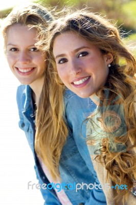 Beautiful Young Girls Looking At The Camera Stock Photo