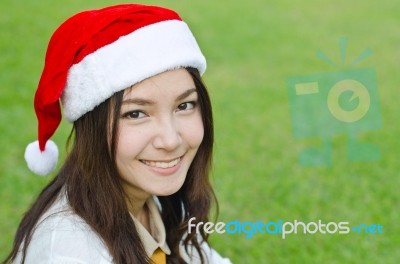 Beautiful Young Santa Clause Woman Stock Photo