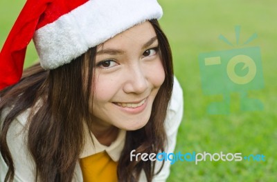 Beautiful Young Santa Clause Woman Stock Photo