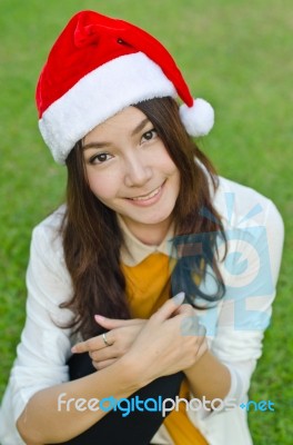 Beautiful Young Santa Clause Woman Stock Photo