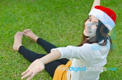 Beautiful Young Santa Clause Woman Stock Photo