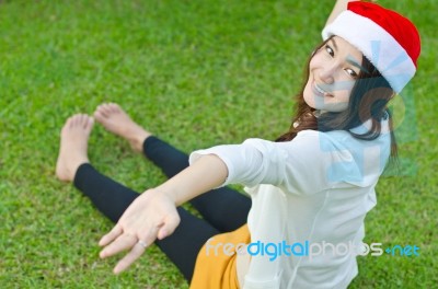 Beautiful Young Santa Clause Woman Stock Photo