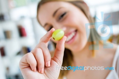 Beautiful Young Woman Enjoying Breakfast At Home Stock Photo