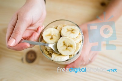 Beautiful Young Woman Enjoying Breakfast At Home Stock Photo