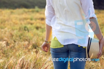 Beautiful Young Woman Enjoying Summer In A Field Stock Photo