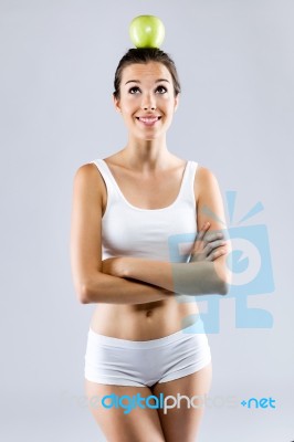 Beautiful Young Woman In White Underwear Holding Green Apple Stock Photo