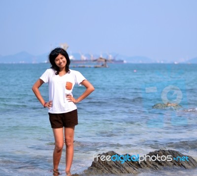 Beautiful Young Woman On Beach Stock Photo