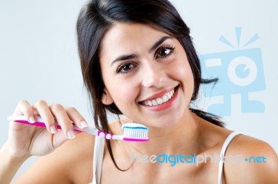 Beautiful Young Woman Picking His Teeth Stock Photo