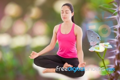 Beautiful Young Woman Practicing Yoga (lotus Position), Butterfl… Stock Photo