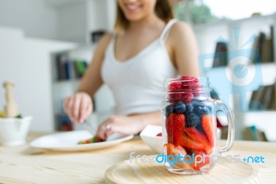 Beautiful Young Woman Preparing Breakfast At Home Stock Photo