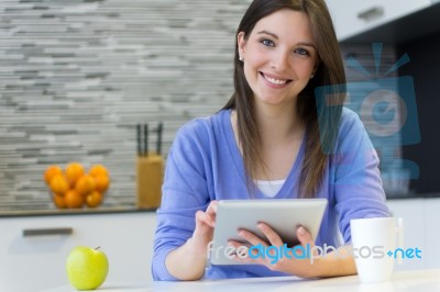 Beautiful Young Woman With Digital Tablet Stock Photo