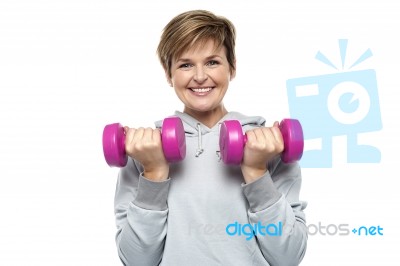 Beautiful Young Woman With Dumbbells Stock Photo