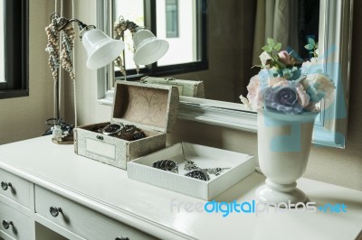 Beauty And Make-up Concept: Mirror,lamp,jewelry And Makeup Box O… Stock Photo