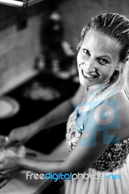 Beauty Woman Cooking And Smiling Stock Photo