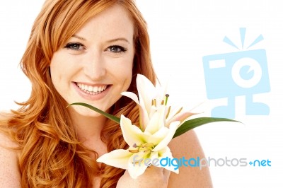 Beauty Woman Holding Lily Flower Stock Photo