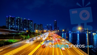 Beautyful Of Traffic In Seoul At Night And Cityscape, South Korea With Motion Blur Stock Photo