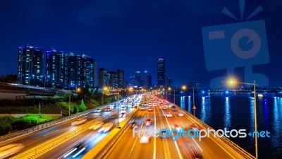 Beautyful Of Traffic In Seoul At Night And Cityscape, South Korea With Motion Blur Stock Photo