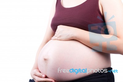 Belly Of A Pregnant Woman Stock Photo