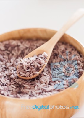 Berry Rice In Wooden Bowl Stock Photo