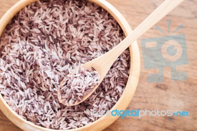 Berry Rice In Wooden Bowl Stock Photo