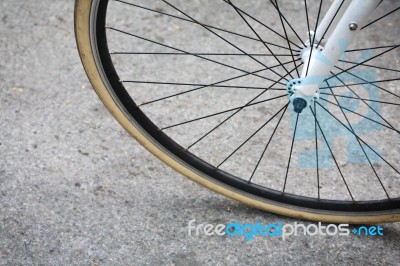 Bicycle Wheel On Street Stock Photo