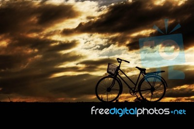 Bicycles With The Silhouettes Stock Photo