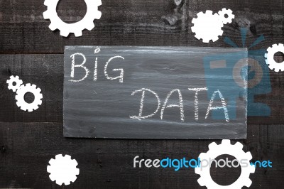 Big Data Letters In A Blackboard And Cogwheels Stock Photo