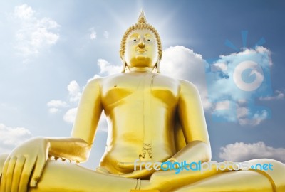 Big Golden Buddha Statue Against Sky Stock Photo