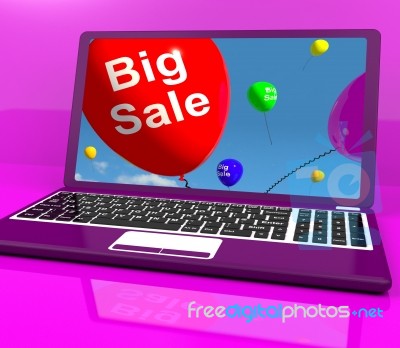 Big Sale Balloon On Laptop Shows Online Discounts Stock Image