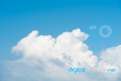 Big White Cloud And Blue Sky Background Stock Photo