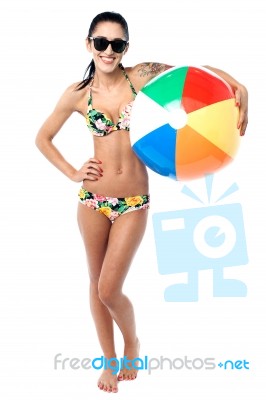 Bikini Woman Holding Colorful Beach Ball Stock Photo