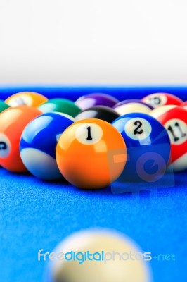 Billiard Balls In A Blue Pool Table Stock Photo