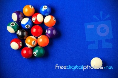 Billiard Balls In A Blue Pool Table Stock Photo