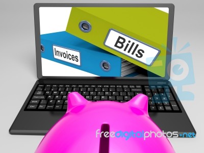 Bills And Invoices Files On Laptop Shows Finances Stock Image