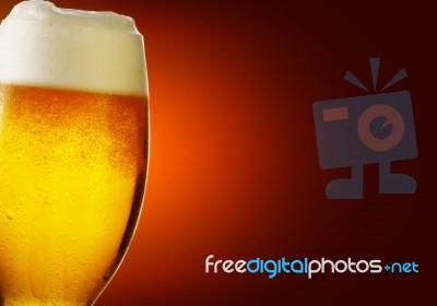 Birra Con Bagliore Stock Photo