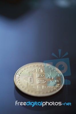 Bitcoin Curency Dof On Blue Light Stock Photo