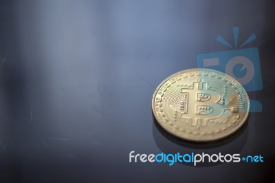 Bitcoin Curency Dof On Blue Light Background Stock Photo