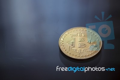 Bitcoin Curency Dof On Blue Light Background Stock Photo