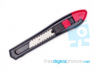 Black And Red Plastic Cutter Knife Isolated Stock Photo