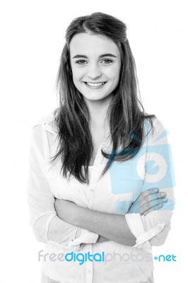 Black And White Image Of A Confident Smiling Girl Stock Photo