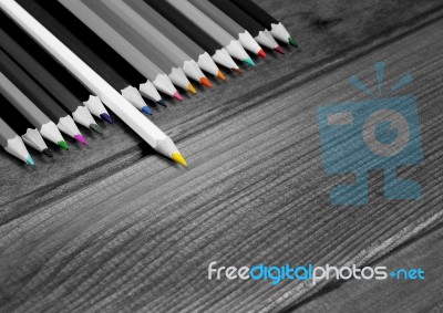 Black And White Image Of Colored Pencils With Isolated Pencil Ag… Stock Photo