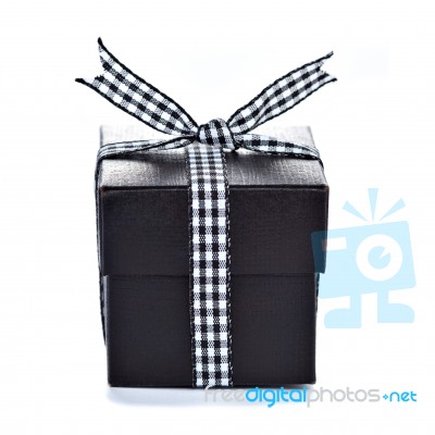 Black Gift Box With Checkered Ribbon Stock Photo