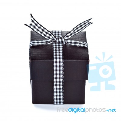 Black Gift Box With Checkered Ribbon Stock Photo