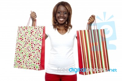 Black Girl Holding Shopping Bag Stock Photo