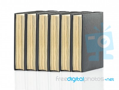 Black Hardcover Book On White Glossy Background Stock Photo