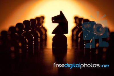 Black Knight And Pawns Stock Photo