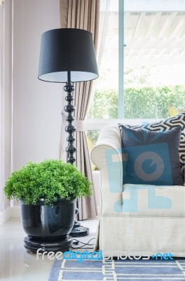 Black Pillows On Classical Style Sofa With Black Lamp Stock Photo