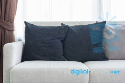 Black Pillows On White Sofa In Modern Living Room Stock Photo