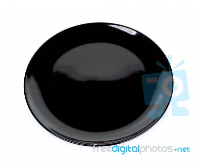 Black Plate Isolated On The White Background Stock Photo